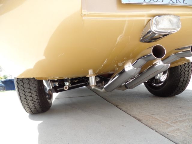 1963 Gold Jaguar E-Type Coupe