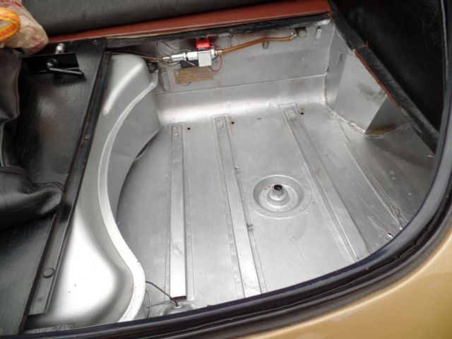 1963 Gold Jaguar E-Type Coupe