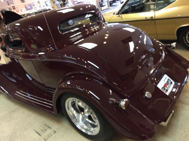 1934 Burgundy Ford 3 window coupe Coupe