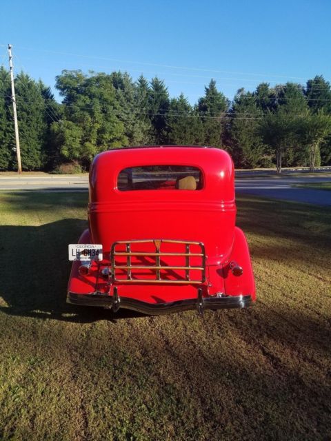 1934 Viper Red Ford Two Door Sedan Sedan