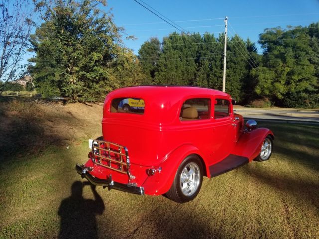 1934 Viper Red Ford Two Door Sedan Sedan