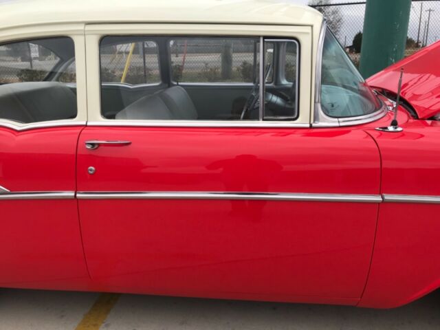 1957 Red Chevrolet Bel Air/150/210 Coupe