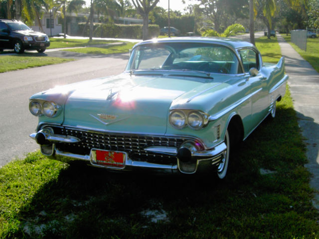 1958 28-29 Turquoise Lower Peacock Upper Cadillac DeVille