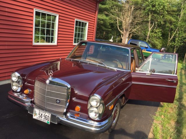 1968 maroon Mercedes-Benz 200-Series Sedan