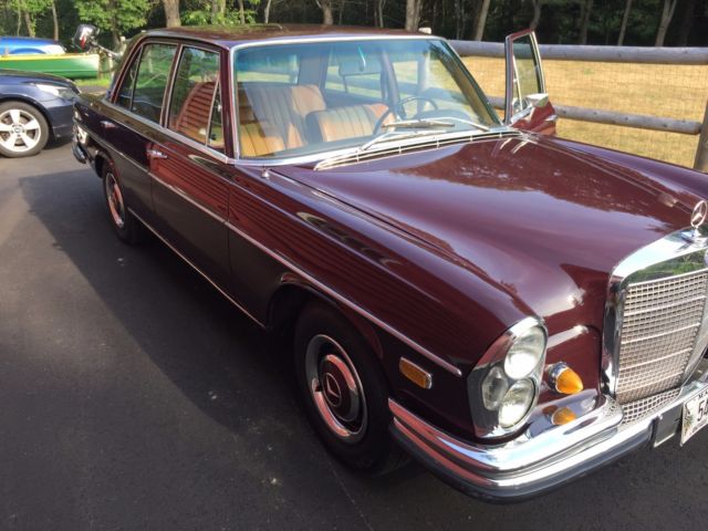 1968 maroon Mercedes-Benz 200-Series Sedan
