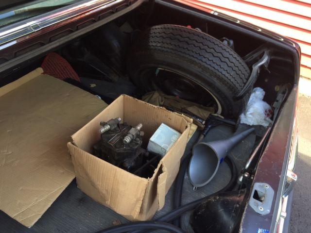 1968 maroon Mercedes-Benz 200-Series Sedan