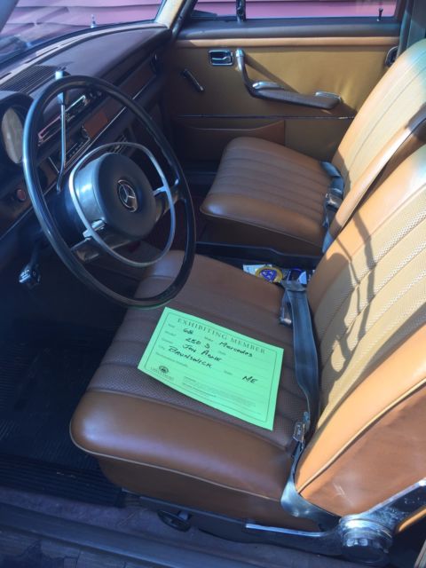 1968 maroon Mercedes-Benz 200-Series Sedan