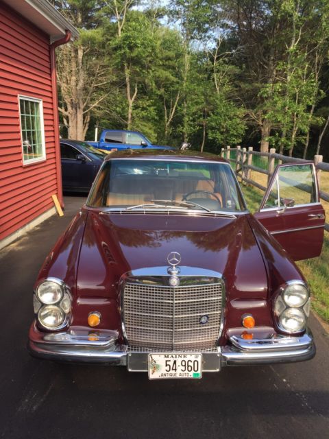 1968 maroon Mercedes-Benz 200-Series Sedan
