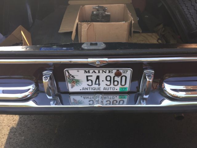 1968 maroon Mercedes-Benz 200-Series Sedan