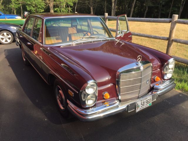 1968 maroon Mercedes-Benz 200-Series Sedan