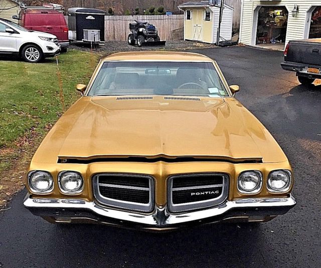 1971 gold Pontiac Le Mans Coupe