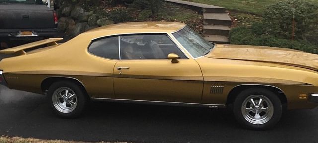 1971 gold Pontiac Le Mans Coupe