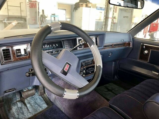 1984 Black Oldsmobile Cutlass Coupe