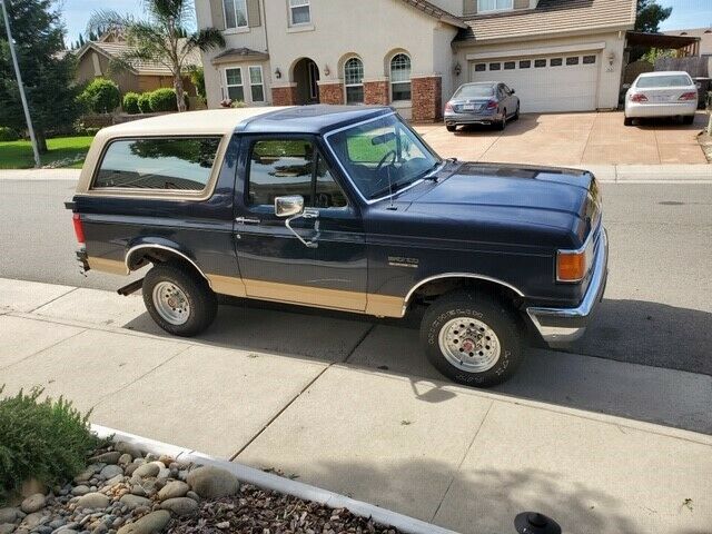 1991 Blue Ford Bronco SUV