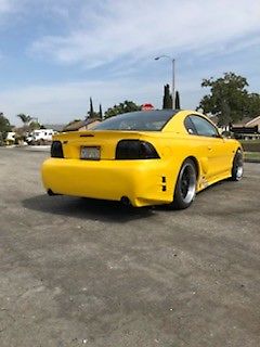 1994 Yellow Ford Mustang