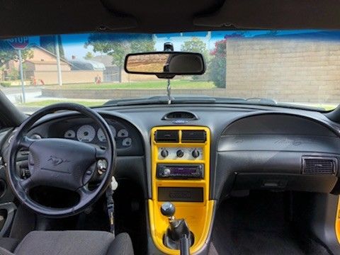1994 Yellow Ford Mustang