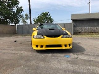 1994 Yellow Ford Mustang
