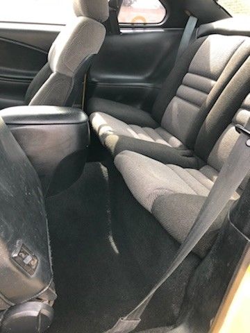 1994 Yellow Ford Mustang