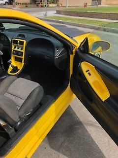 1994 Yellow Ford Mustang