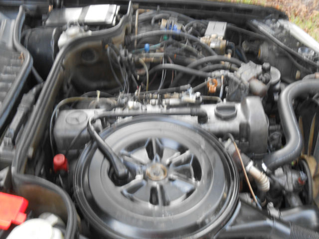 1985 Black Mercedes-Benz 300-Series 4 door