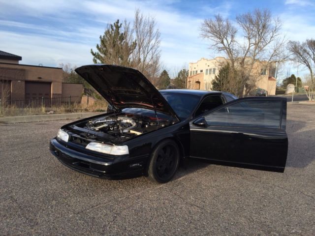 1990 Black Ford Thunderbird Coupe