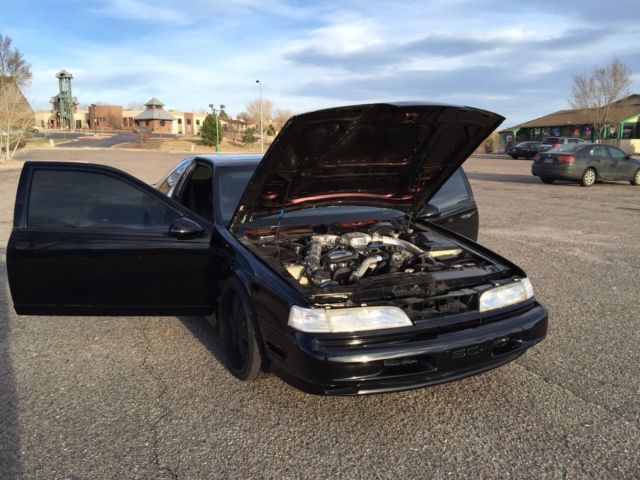 1990 Black Ford Thunderbird Coupe