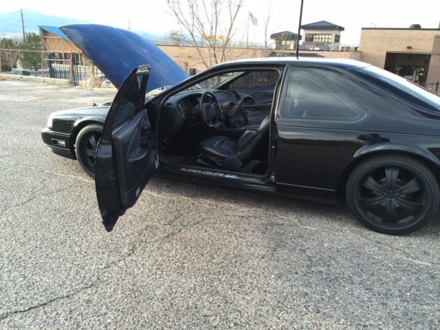 1990 Black Ford Thunderbird Coupe