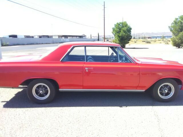 1964 Red Oldsmobile Cutlass Coupe