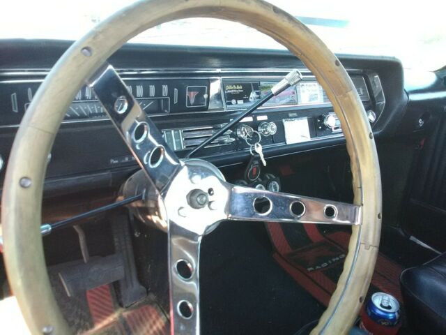 1964 Red Oldsmobile Cutlass Coupe