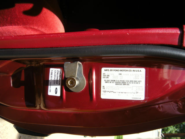 1988 Red Ford Thunderbird Coupe