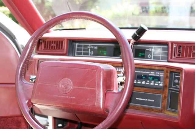 1990 White Cadillac DeVille Sedan