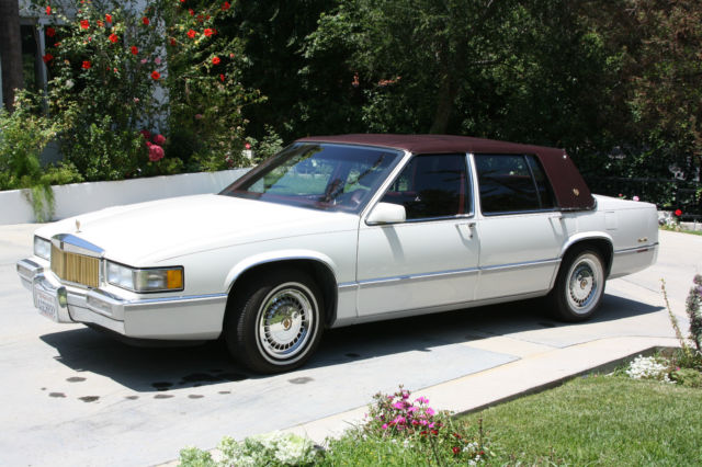 1990 White Cadillac DeVille Sedan