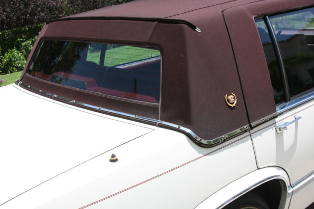 1990 White Cadillac DeVille Sedan