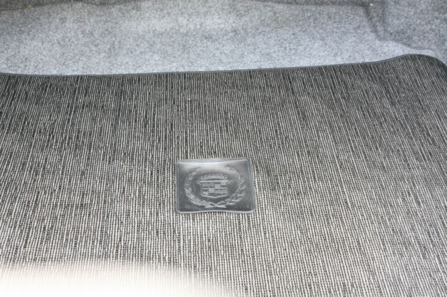 1990 White Cadillac DeVille Sedan