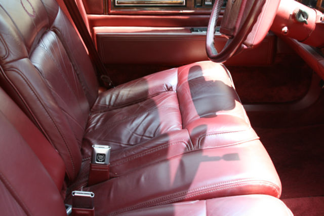 1990 White Cadillac DeVille Sedan