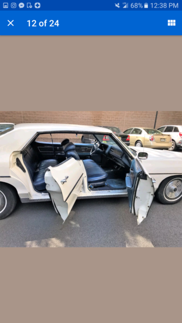 1969 White Pontiac Bonneville Sedan