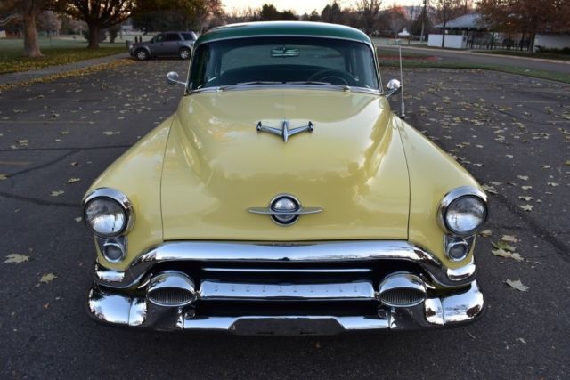 1953 Yellow Oldsmobile Eighty-Eight Sedan