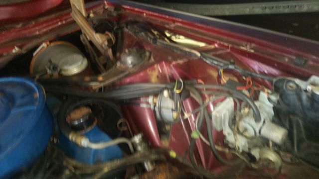 1966 Burgundy Ford Thunderbird 2dr full black vinyl top with tan/cream interior