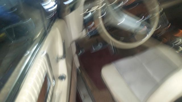 1966 Burgundy Ford Thunderbird 2dr full black vinyl top with tan/cream interior