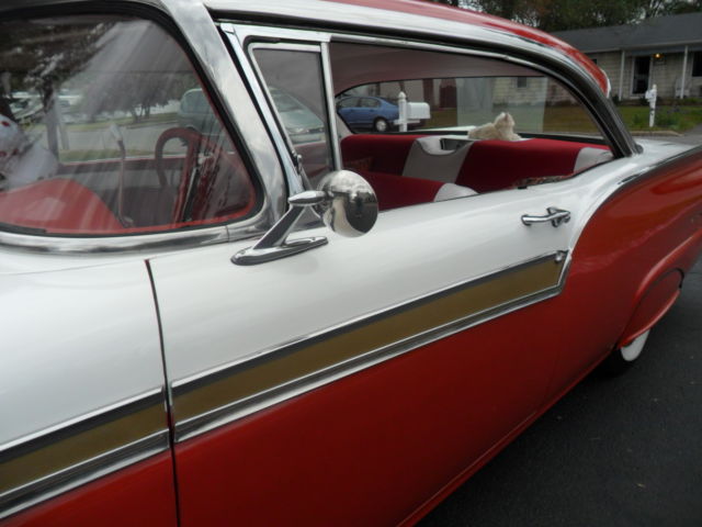 1957 Red/white Ford Fairlane hardtop coupe