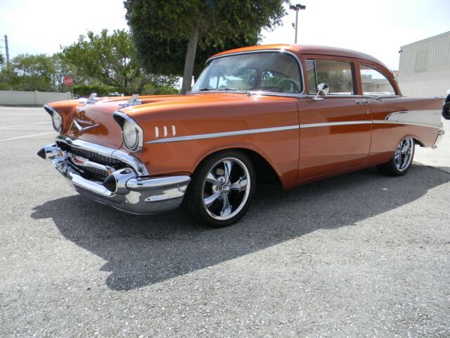 1957 Atomic Orange Chevrolet Bel Air/150/210 2 door post