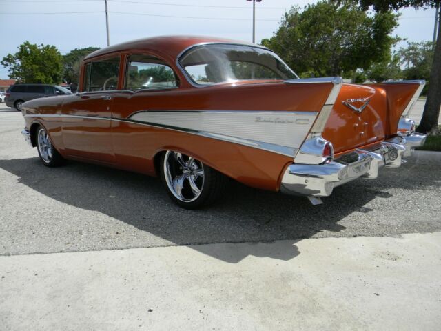 1957 Atomic Orange Chevrolet Bel Air/150/210 2 door post