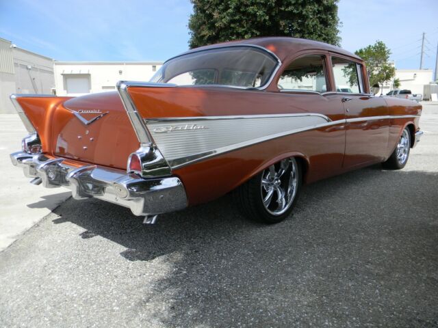 1957 Atomic Orange Chevrolet Bel Air/150/210 2 door post