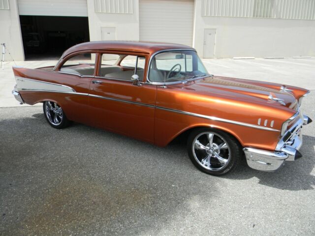1957 Atomic Orange Chevrolet Bel Air/150/210 2 door post