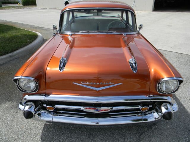 1957 Atomic Orange Chevrolet Bel Air/150/210 2 door post