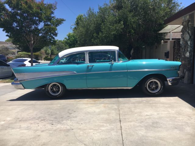 1957 turquoise and India Ivory Chevrolet Bel Air/150/210 sedan