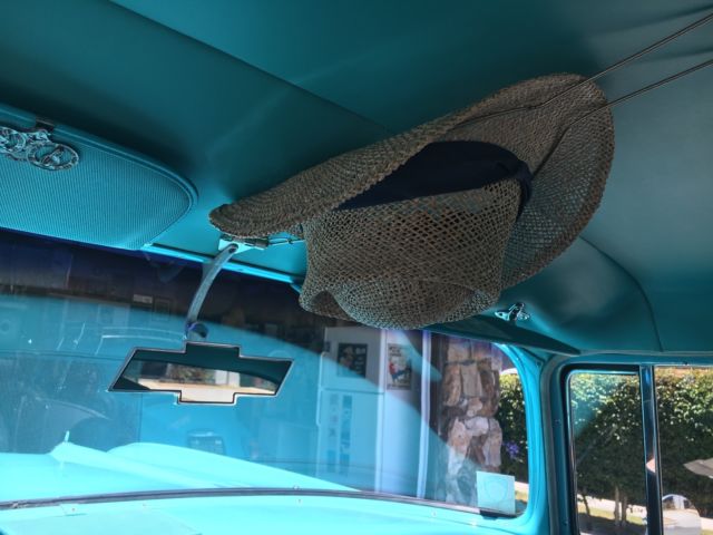 1957 turquoise and India Ivory Chevrolet Bel Air/150/210 sedan