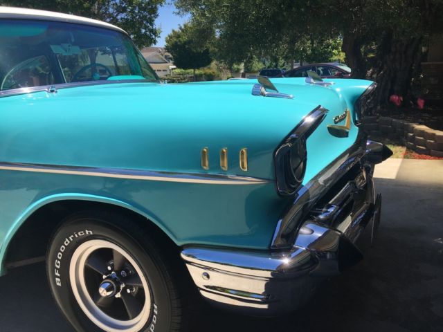 1957 turquoise and India Ivory Chevrolet Bel Air/150/210 sedan
