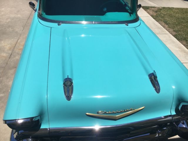 1957 turquoise and India Ivory Chevrolet Bel Air/150/210 sedan