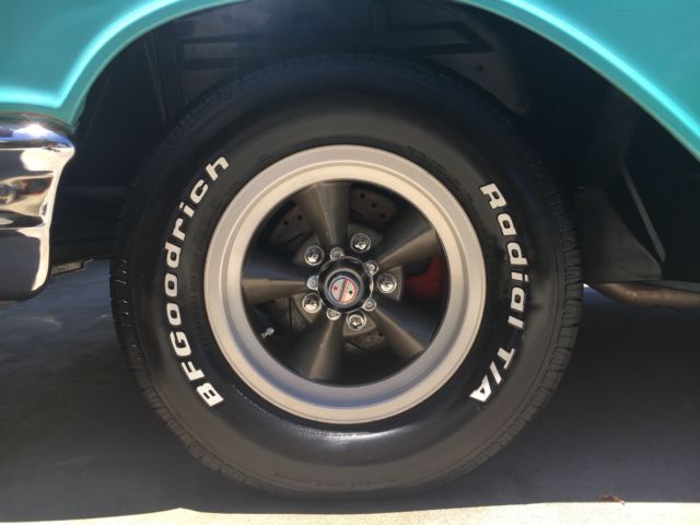 1957 turquoise and India Ivory Chevrolet Bel Air/150/210 sedan